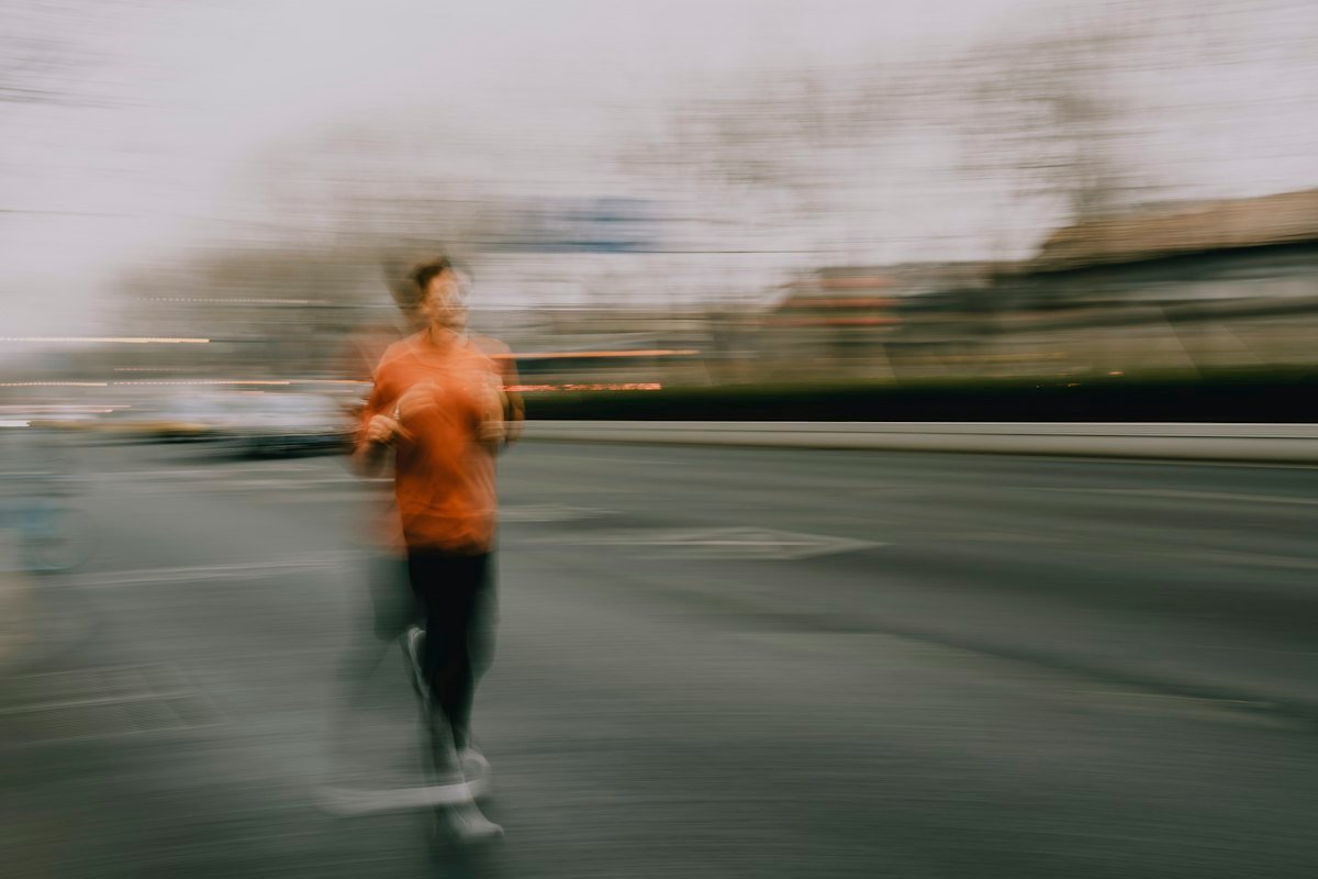 Person running outdoors as part of an active, healthy lifestyle